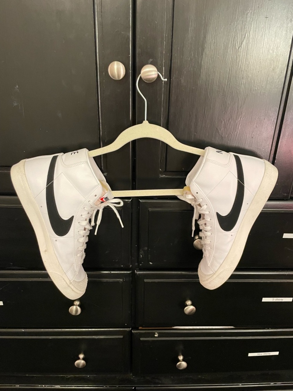 Nike White High-Top Sneakers with Black Swoosh Accent